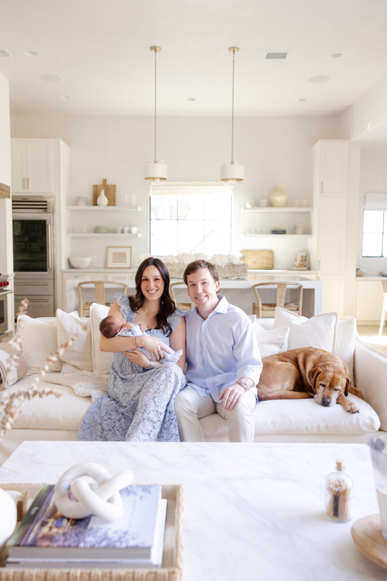 Family portrait in their living room during an in home newborn photography session in Houston.